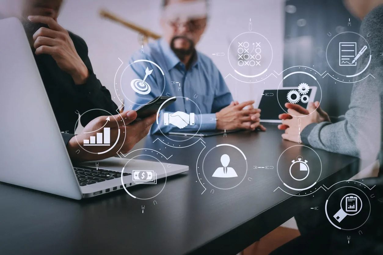 Matt working directly with clients in a collaborative business technology setting